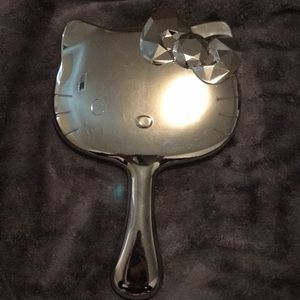 Hello kitty hand mirror.